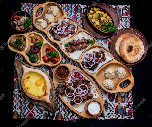 georgian-cuisine-food-set-khachapuri-dolma-satsivi-khinkali-pkhali_179755-2614